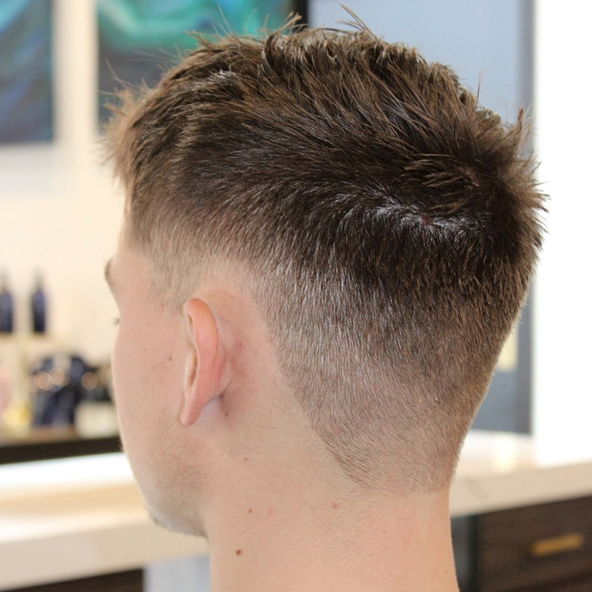 Men's clipper cut with a skin fade at Hyde Salon Chapin