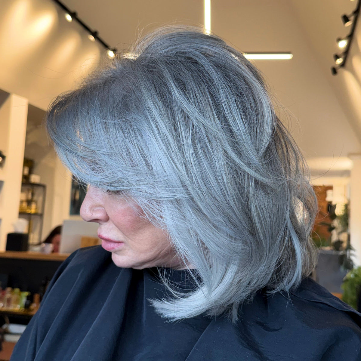 Hyde Salon Vista guest with silver grey blended hair styled in a soft bob
